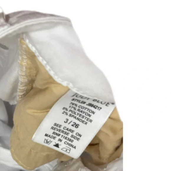 JUDY BLUE white, distressed, mid-rise boyfriend-fit jeans with a raw hem 3/26 - Picture 10 of 11